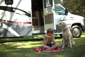 Boy and dog in RV park